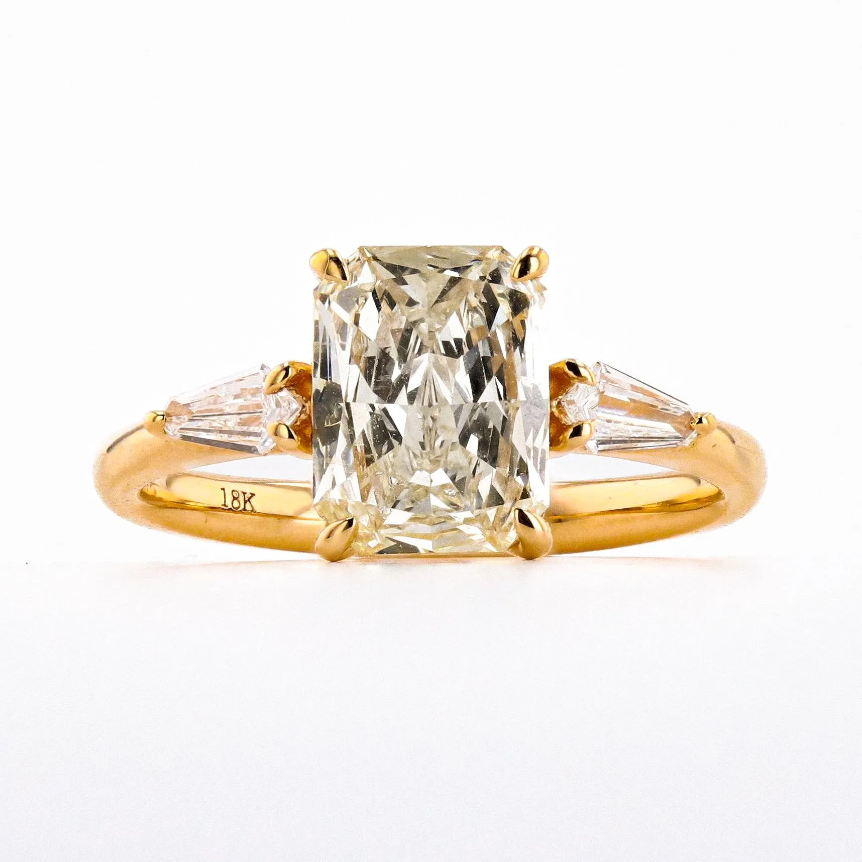 1.70 CARAT CHAMPAGNE RADIANT DIAMOND THREE STONE RING