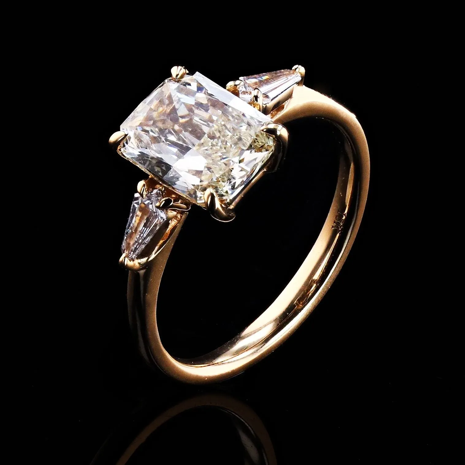 1.70 CARAT CHAMPAGNE RADIANT DIAMOND THREE STONE RING