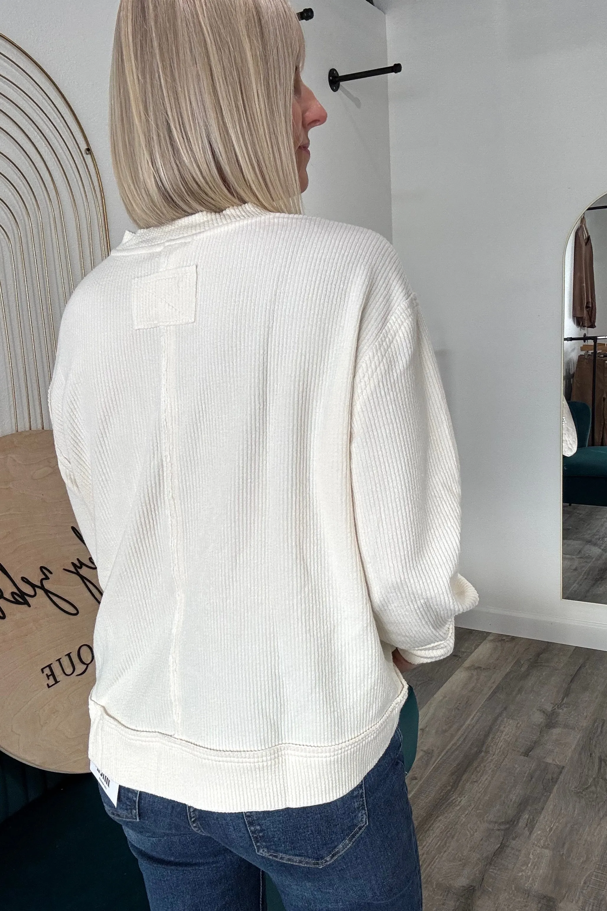 Denna Raw Edge Split Neck Top